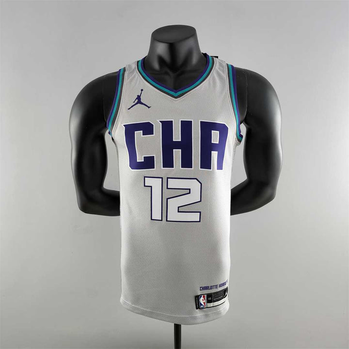 Charlotte Hornets 12 OUBRE JR