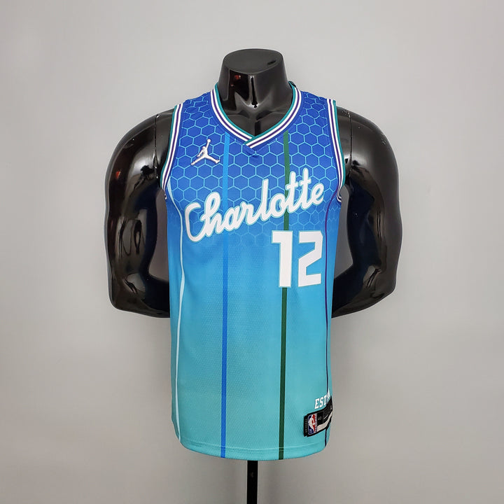 Charlotte Hornets 12 OUBRE JR